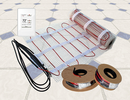 Floor heating mat, cable spools and thermostat.